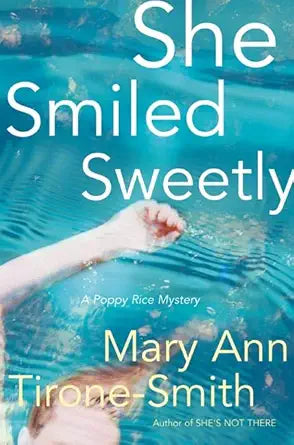 She Smiled Sweetly: A Poppy Rice Mystery cover image