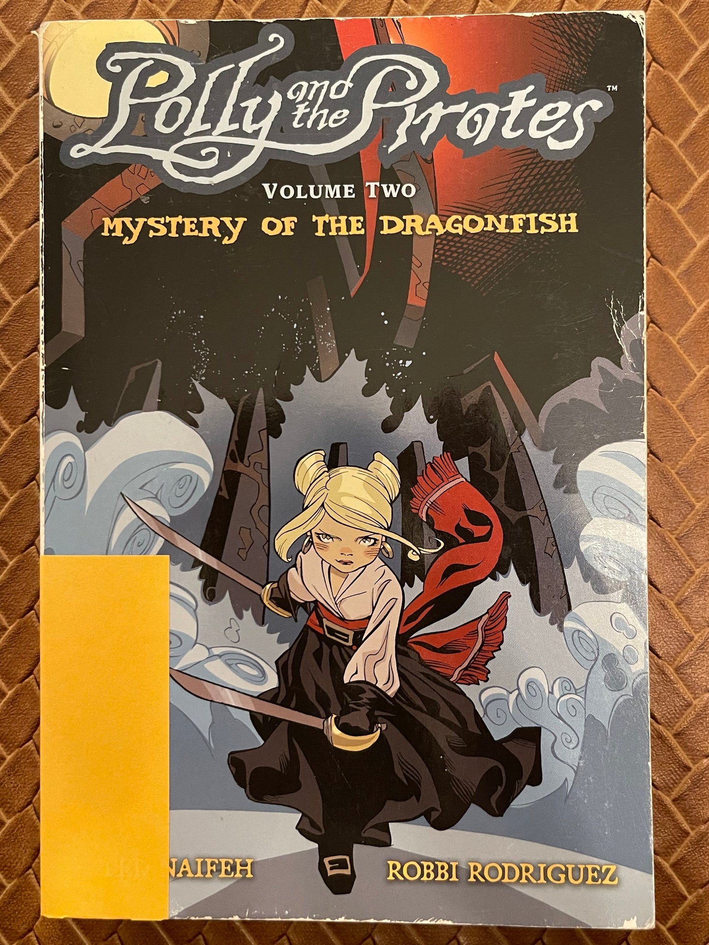 Polly and the Pirates, Volume 2: Mystery of the Dragonfish by Ted Naifeh (Written by), Robbi Rodriguez (Illustrated by)