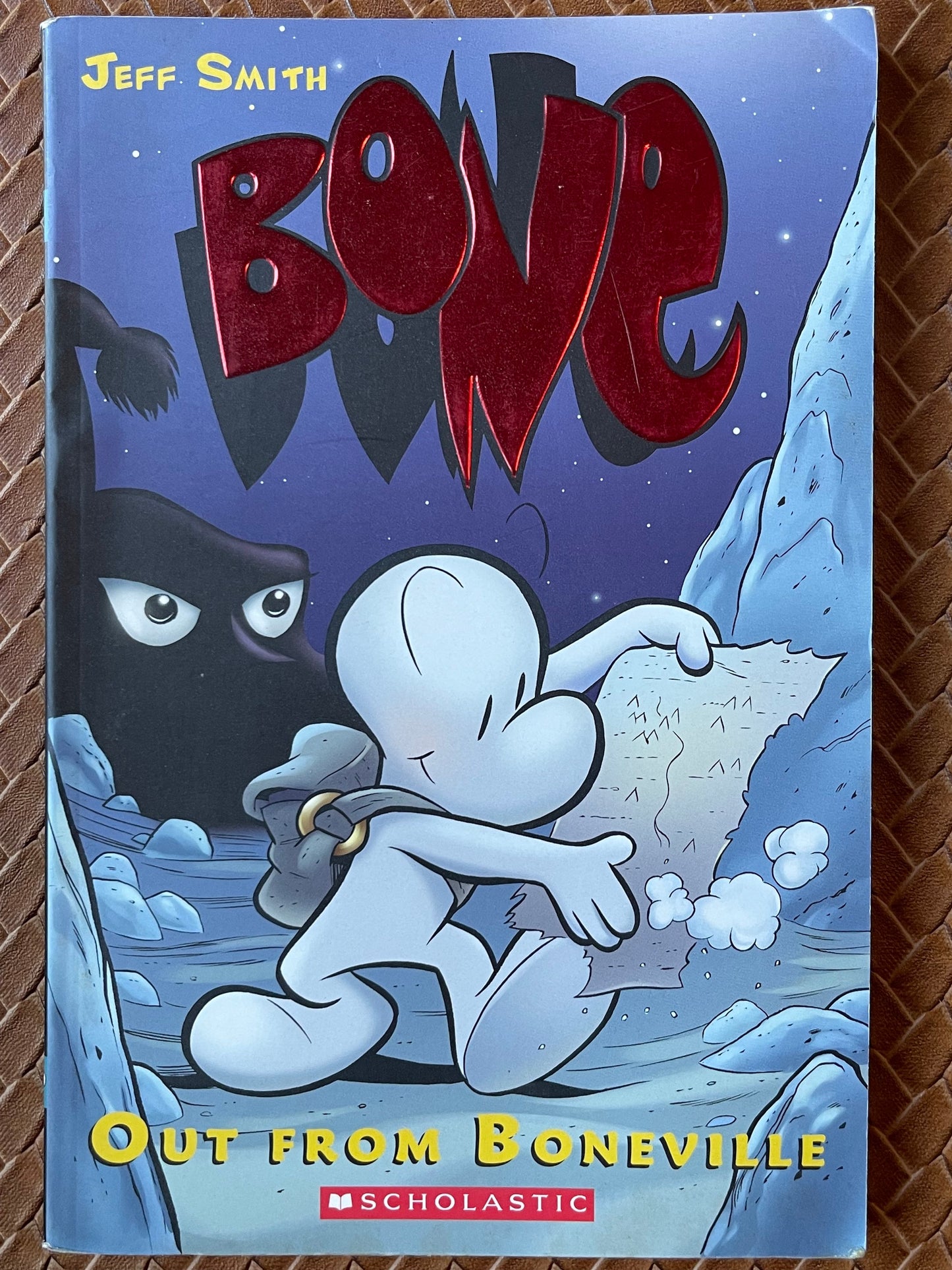 Bone, Vol. 1: Out from Boneville (Bone #1) by Jeff Smith, Steve Hamaker (Colorist )