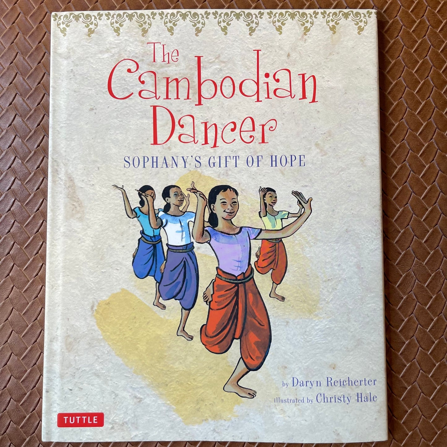 The Cambodian Dancer: Sophany and the Cambodian Dance by Daryn Reicherter, Christy Hale (Illustrations), Bophal Penh (Translation)