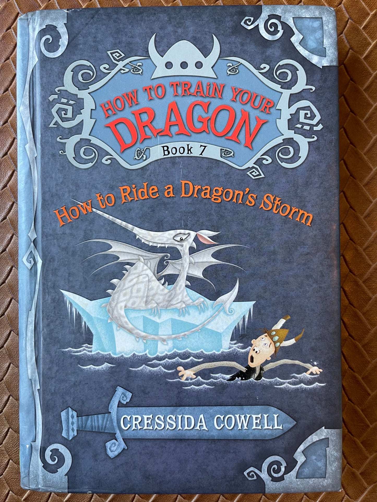 How to Train Your Dragon #7: How To Ride A Dragon's Storm by Cressida Cowell