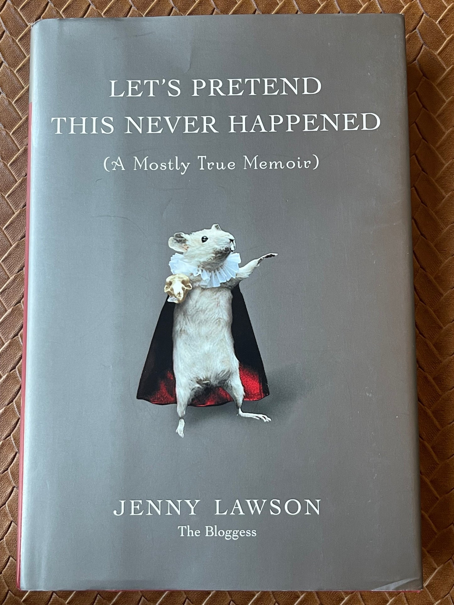 Let's Pretend This Never Happened: (A Mostly True Memoir) by Jenny Lawson