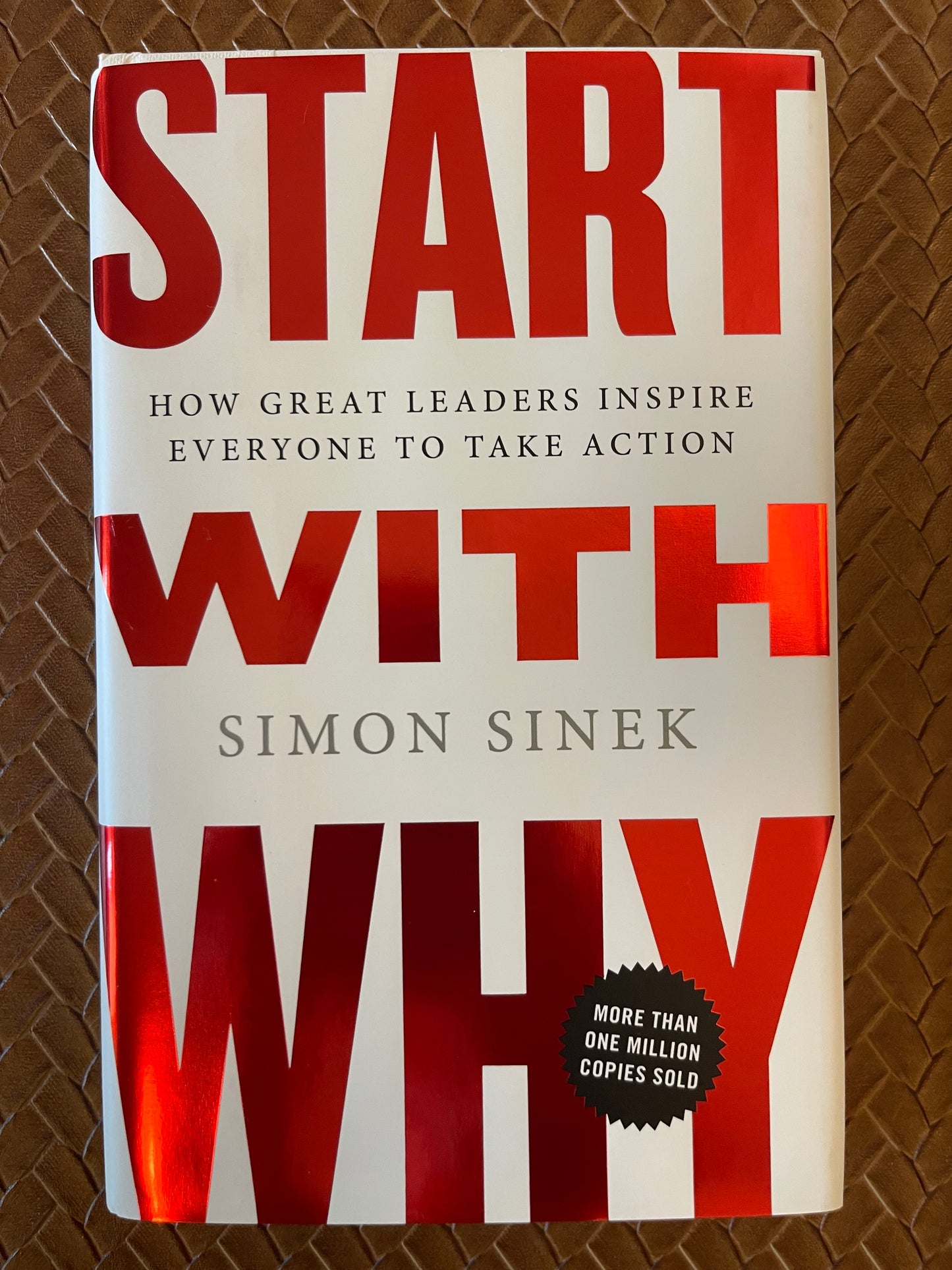 Start with Why: How Great Leaders Inspire Everyone to Take Action by Simon Sinek Hardcover)